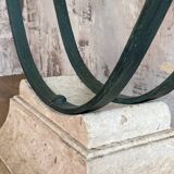 Console in glass and antique patinated metal