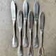 6 Christofle fish knives in silver-plated metal, shell design.