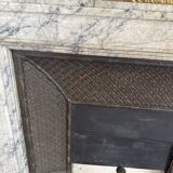 Louis XVI fireplace in veined grey marble with original gilded bronzes from the 19th century.