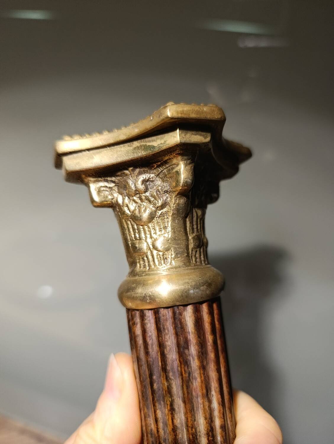 Golden brass candlestick, Corinthian style, vintage
