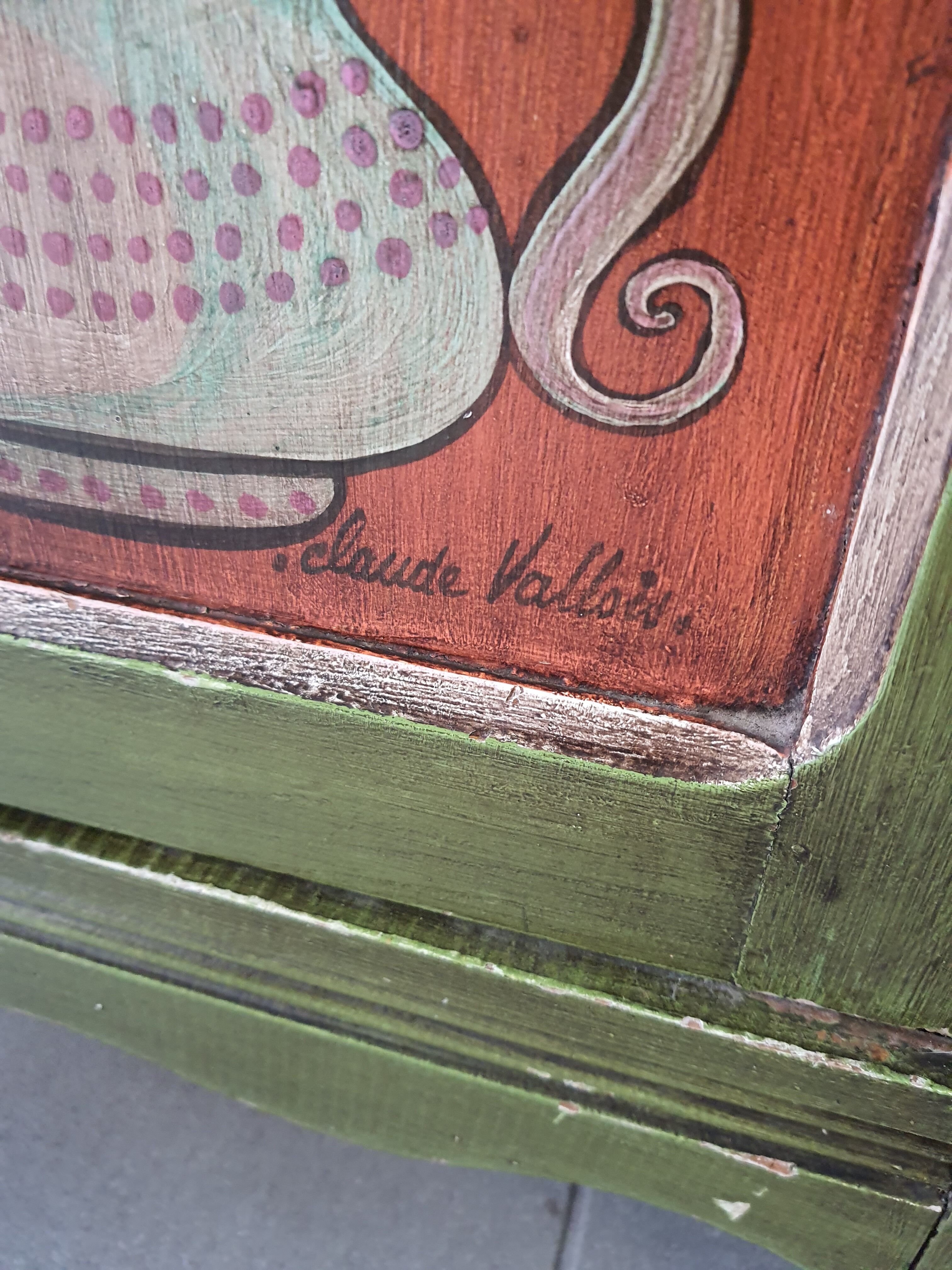 Hand-painted and signed notched cabinet