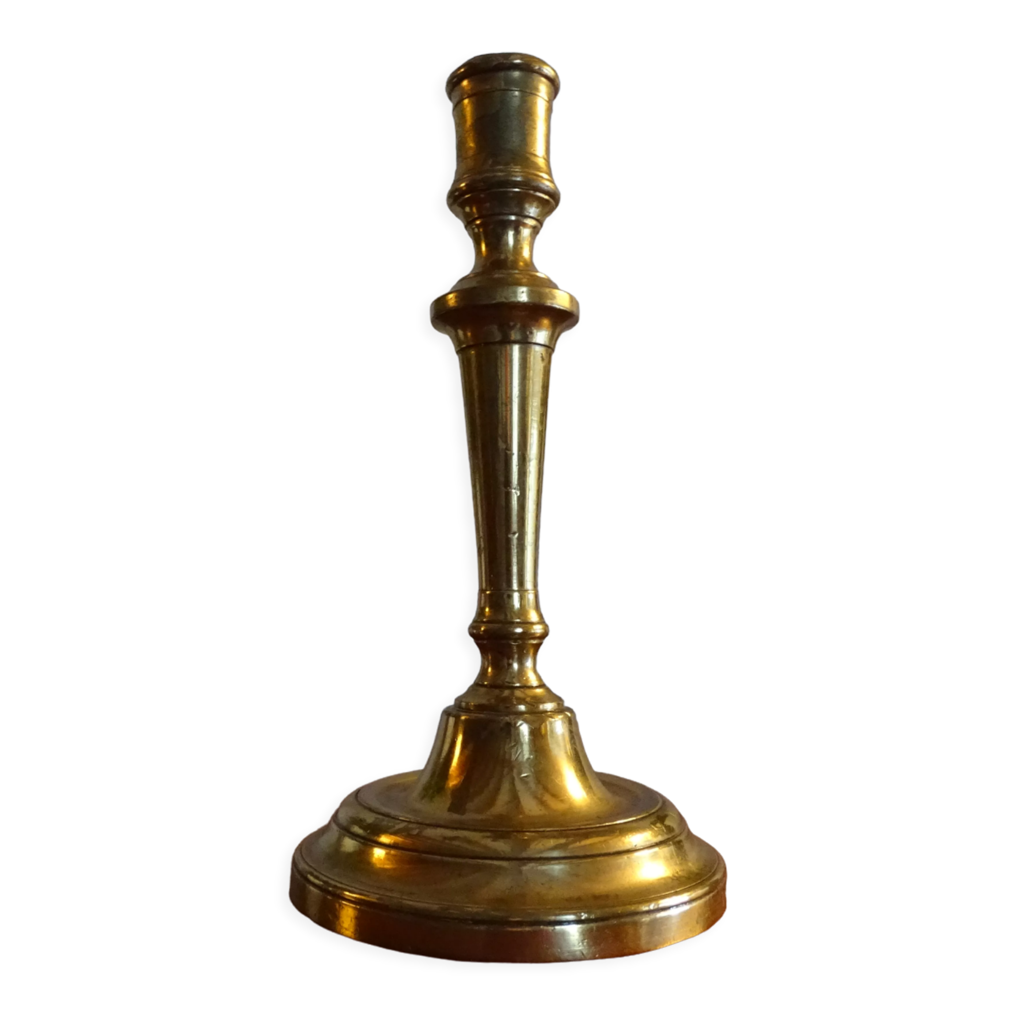 Old brass candle holder and its candle 21.5 cm