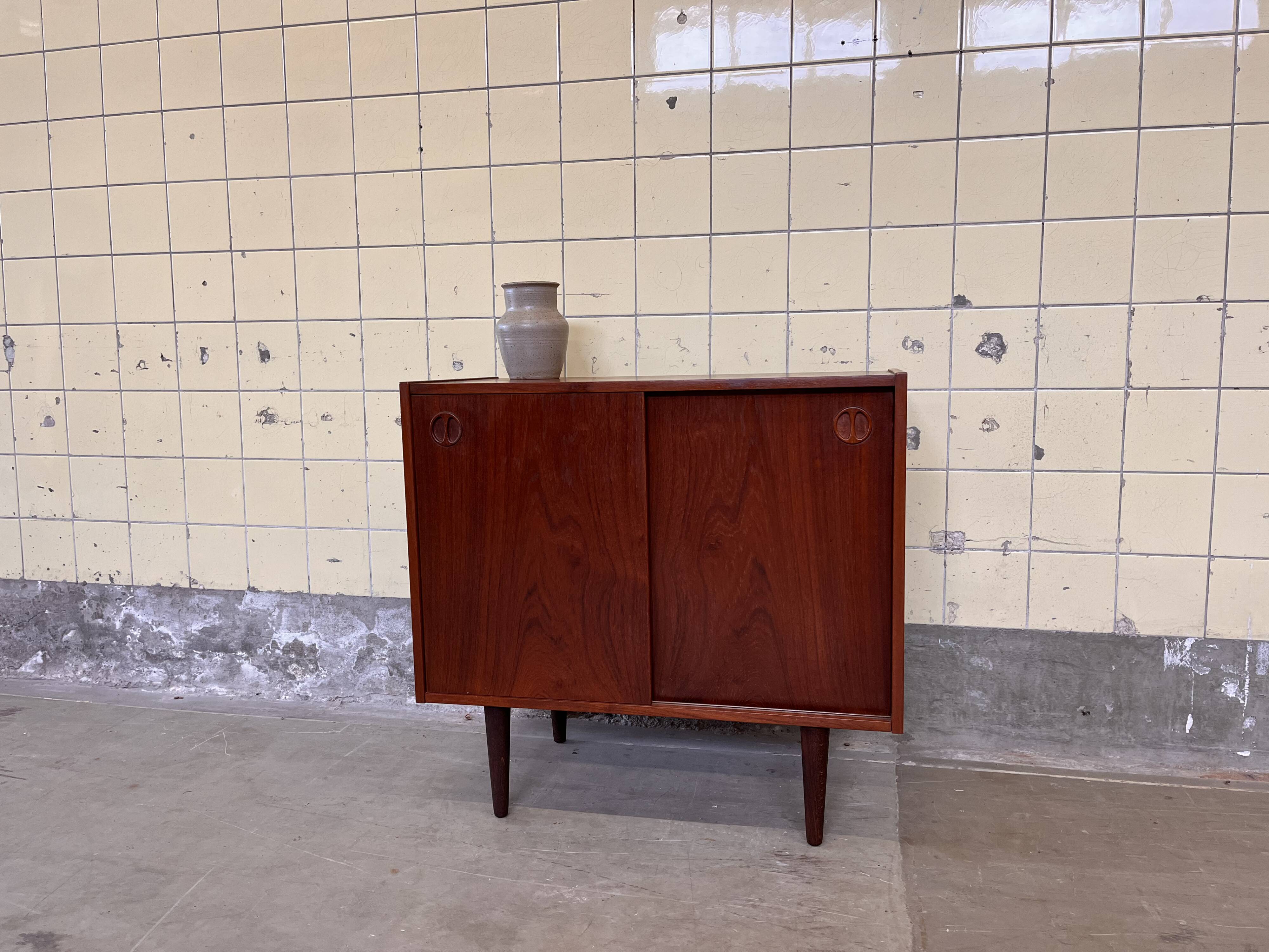 Vintage Danish cabinet with sliding doors
