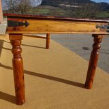 Solid wood and wrought iron table