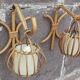 Pair of Louis Sognot rattan wall lights.