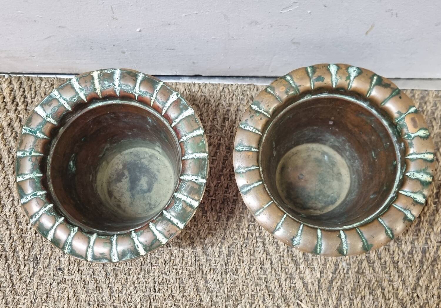 2 copper pot covers, 1960