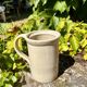 Ceramic pot with handle