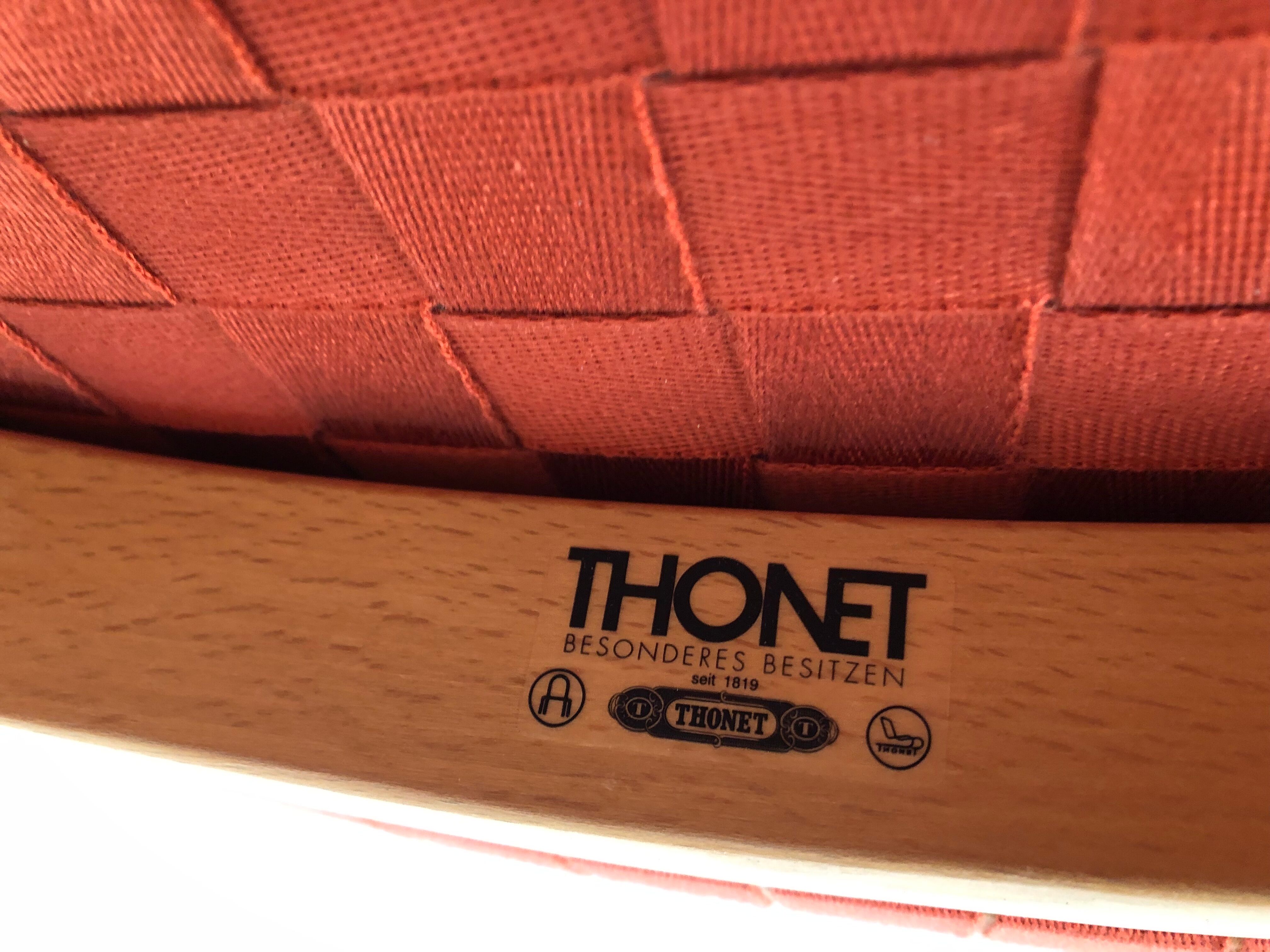 Peter Maly's 737 red chairs for vintage Thonet