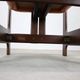 Vintage German sculptural chair from the 1970s in wood with orange faux leather.
