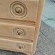 Vintage commode with tapered legs.