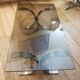 Table basse en acier brossé et verre fumé