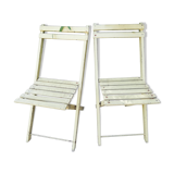 Two folding garden chairs