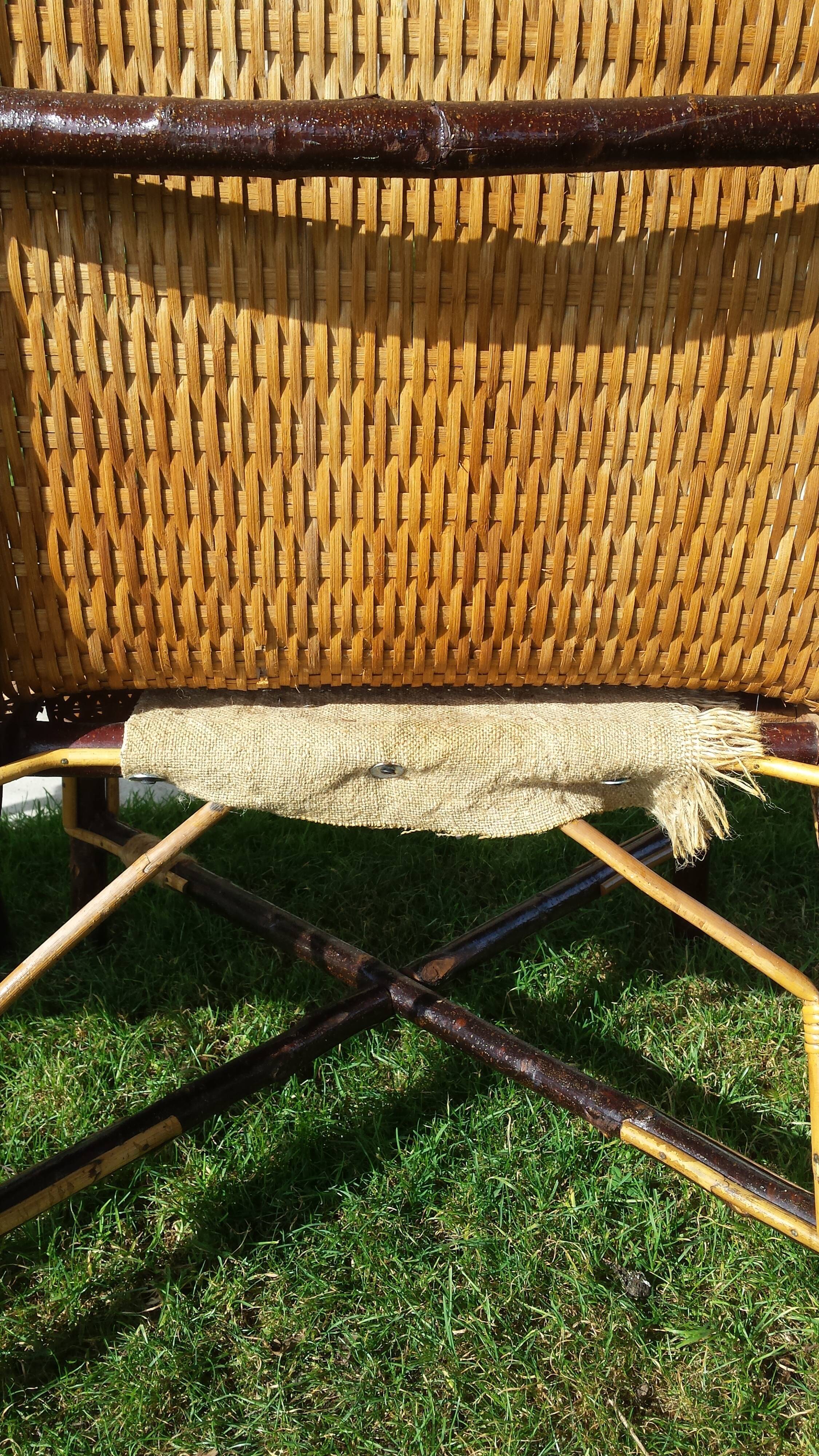 Wicker or rattan armchairs and bamboo