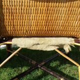 Wicker or rattan armchairs and bamboo
