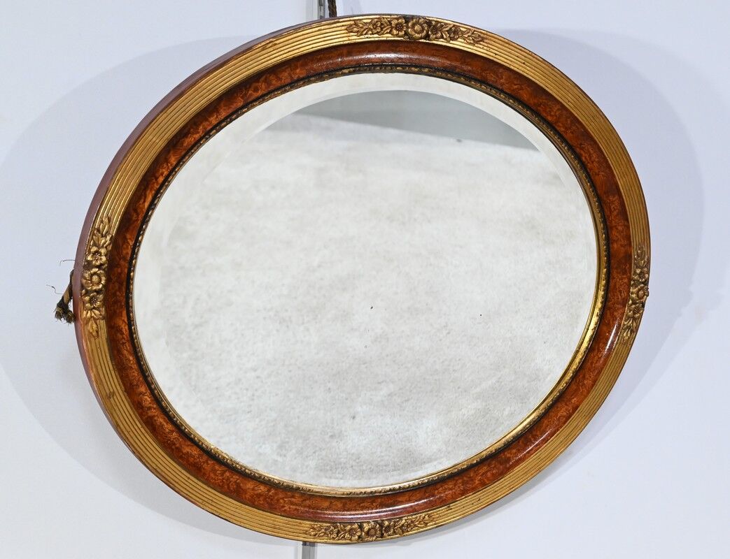Oval mirror in gilded wood – early twentieth century
