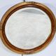 Miroir ovale en bois doré – début XXe