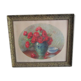 Bouquet of flowers with old wooden frame and gilded stucco