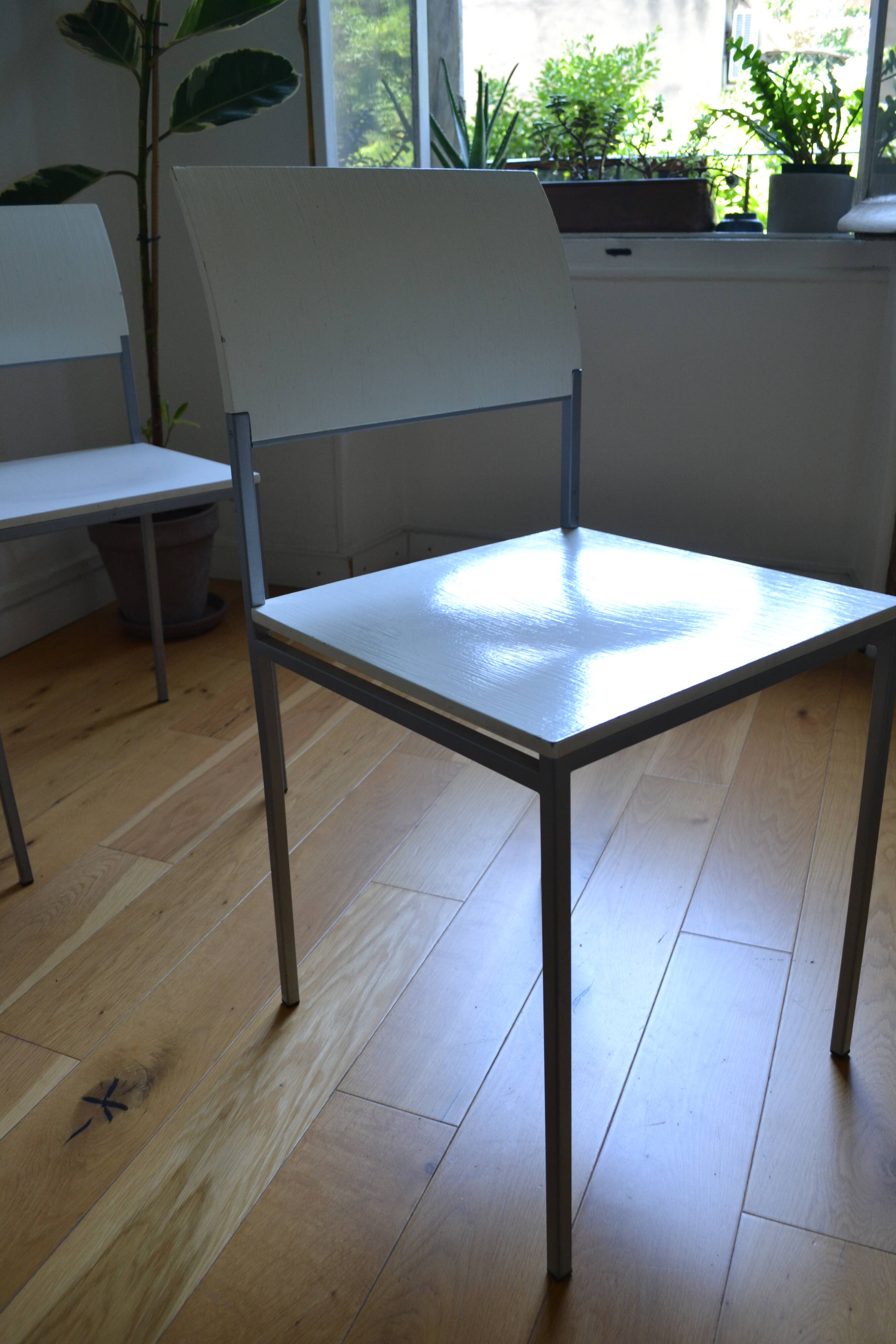 Set of 4 vintage metal and wood chairs from the 1990s.