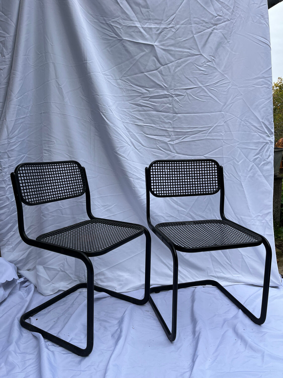 2 metal chairs