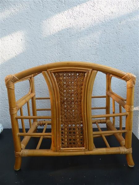 Wicker rattan magazine rack with vintage caning