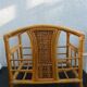 Wicker rattan magazine rack with vintage caning