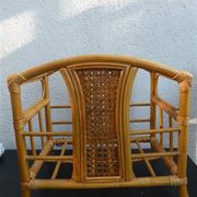 Wicker rattan magazine rack with vintage caning