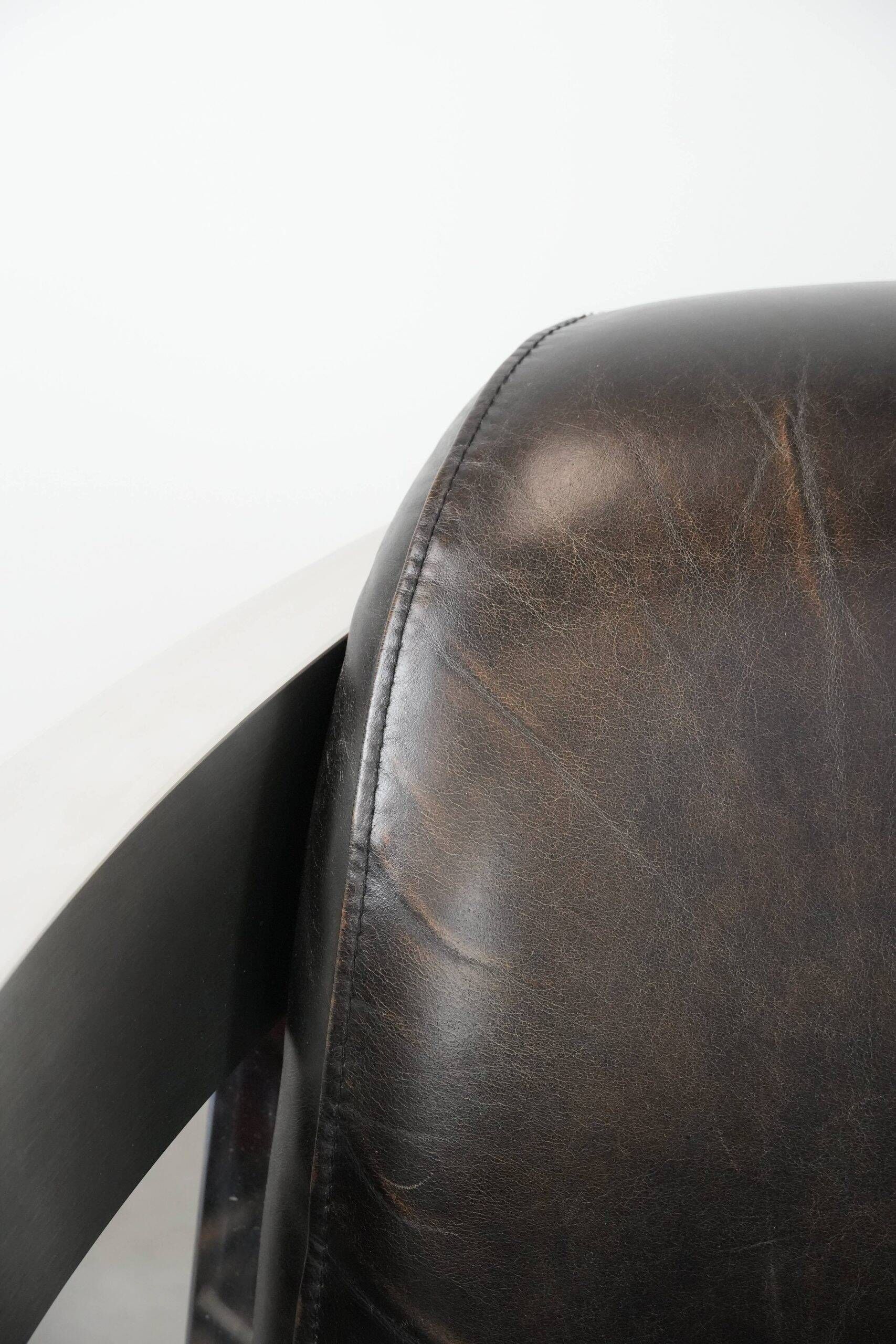 Set of two cowhide leather Aviator design armchairs with aluminium