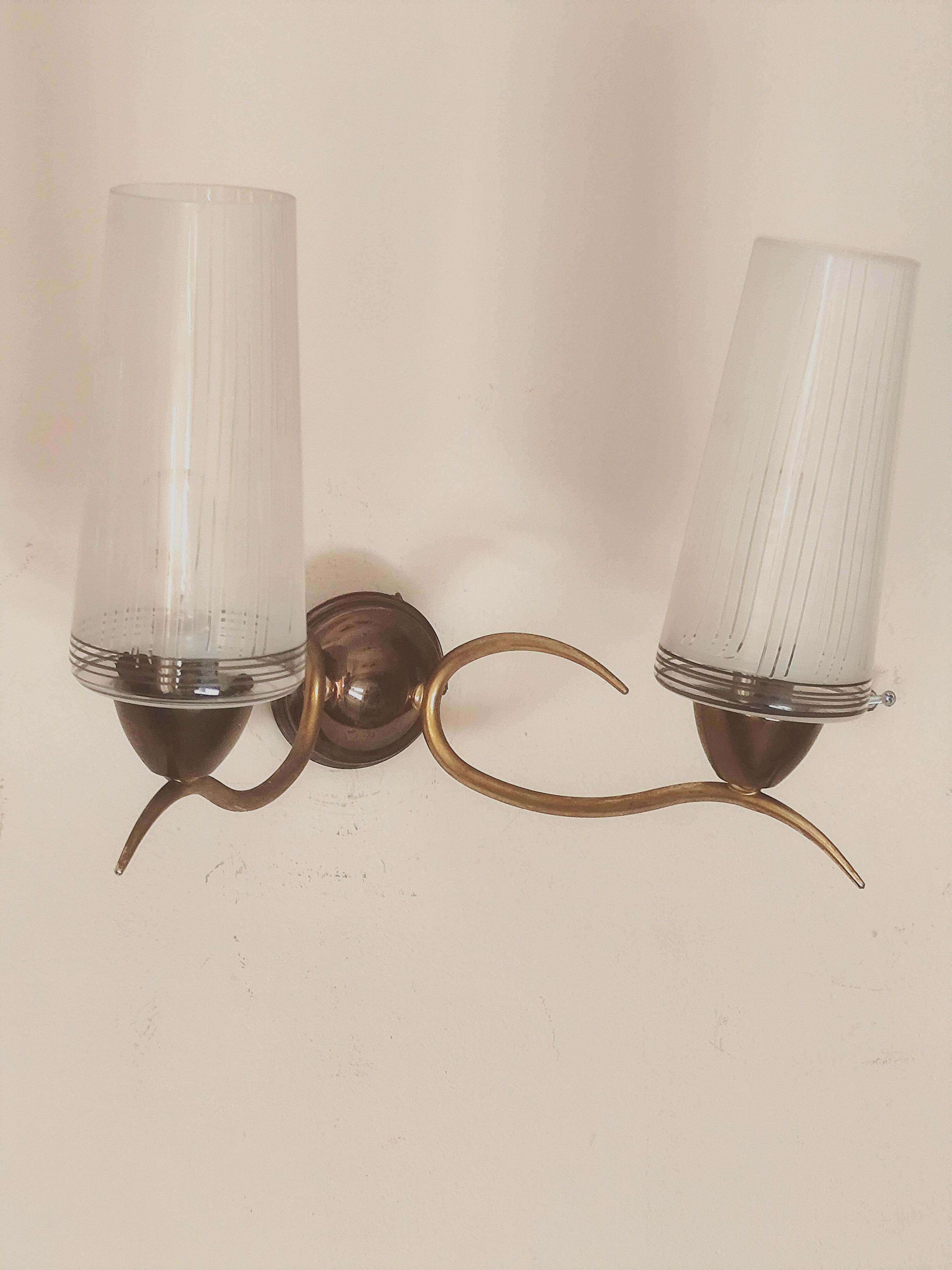 Two-light wall sconce in gilded metal with opaque glass shades, 1950/1960