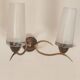 Two-light wall sconce in gilded metal with opaque glass shades, 1950/1960