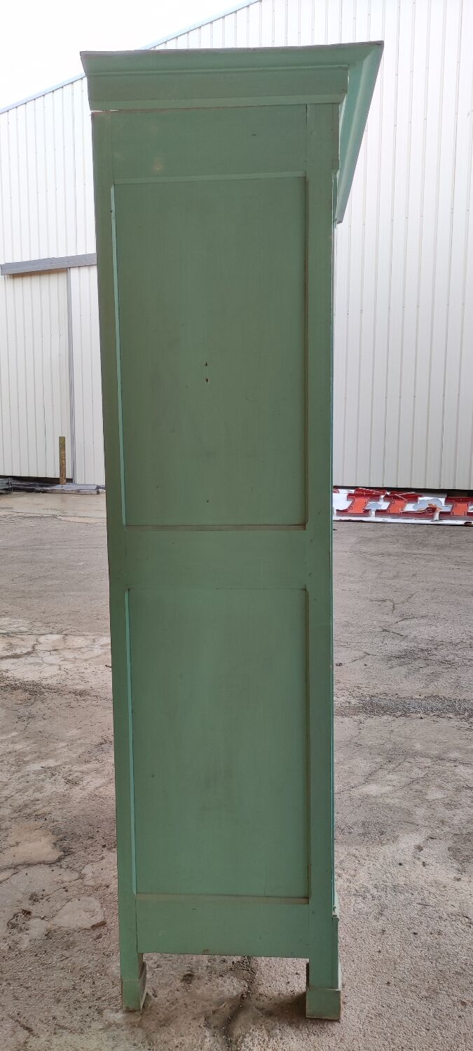 Antique patinated two-door cabinet