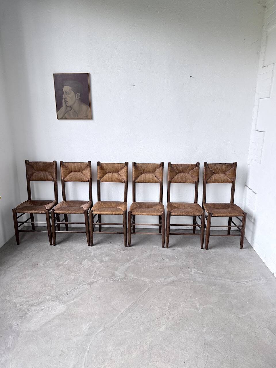 Set of 6 straw and oak Beauche chairs.