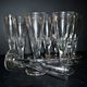 Portieux? Set of 10 cut glass champagne flutes from 1900 bistro.