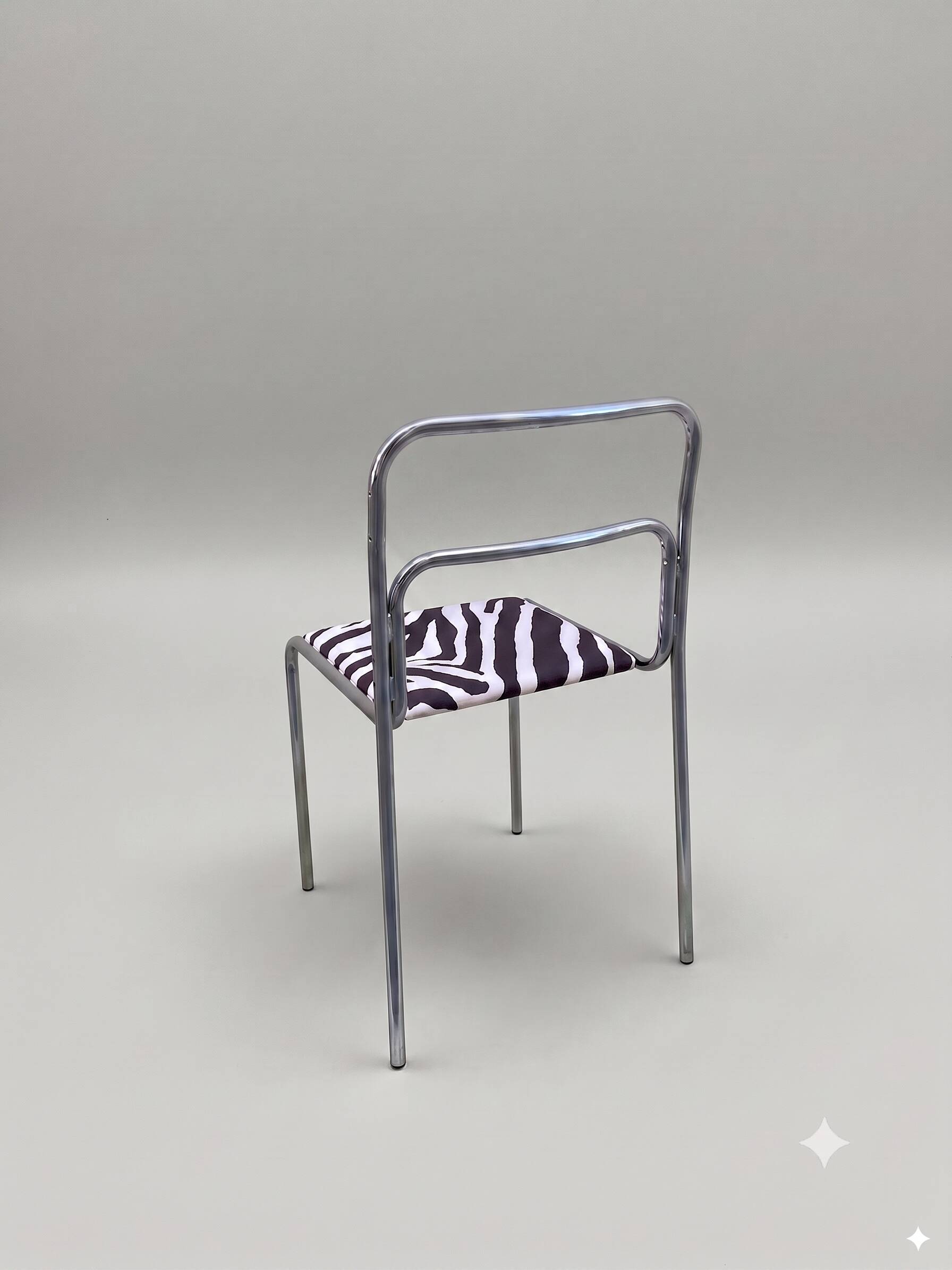 Chrome chair in Bauhaus style with zebra fabric
