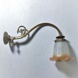 Brass wall lamp with speckled glass tulip