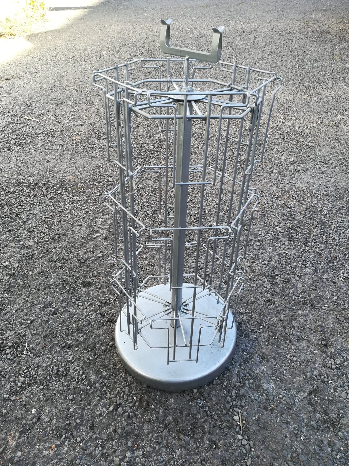 Postcard turnstile display in silver metal