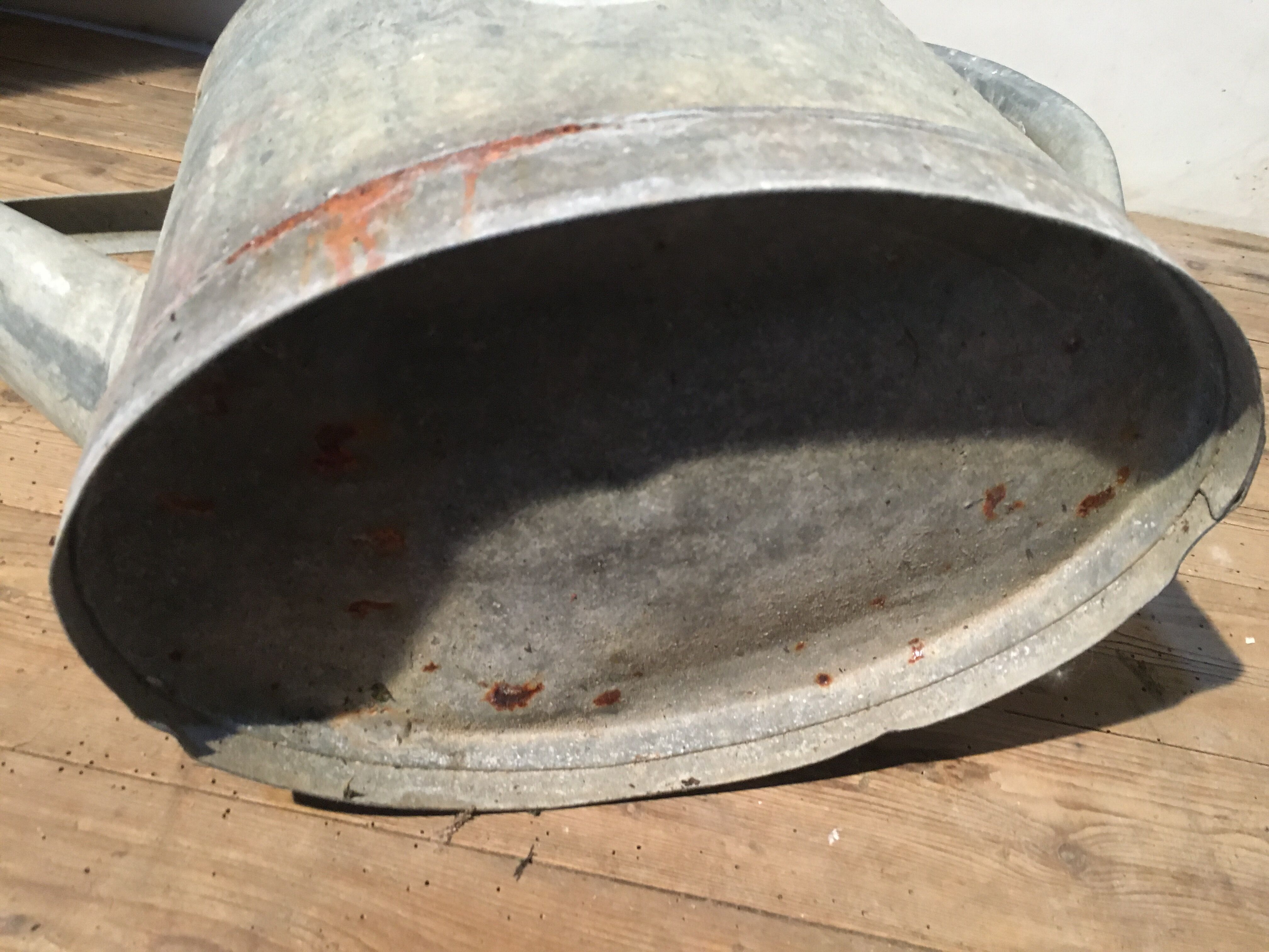 Zinc and copper apple watering can