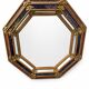 Octagonal wall mirror in cobalt blue eglomisé glass and gilded wood, Spain.