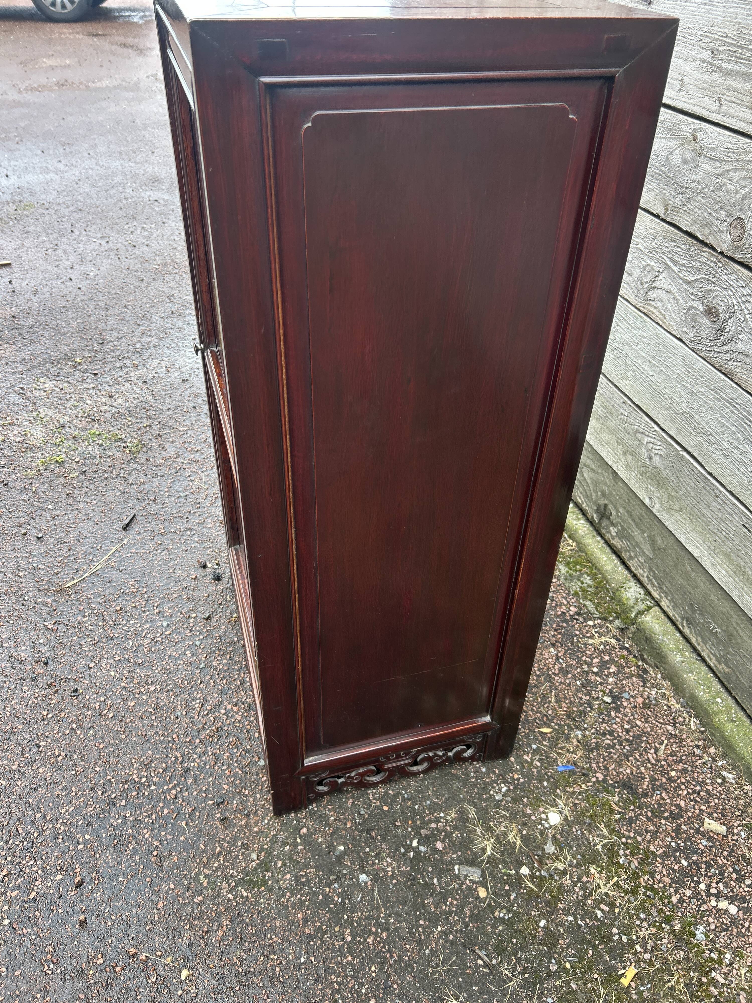 Small cabinet with one door, Indonesian.