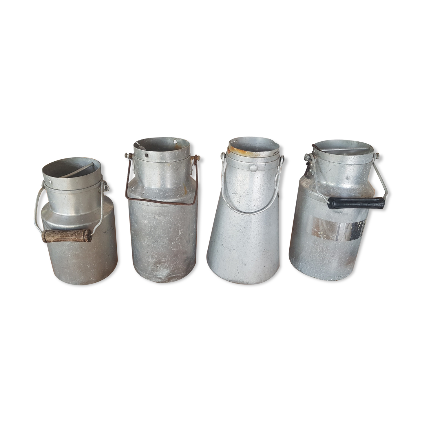 Set of 4 old metal milk canister jars