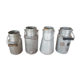 Set of 4 old metal milk canister jars