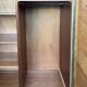 Mid-century wardrobe from the 1960s in wood, with a chevron front and tapered legs.