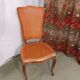 Caned chair in Louis XV style painted orange.