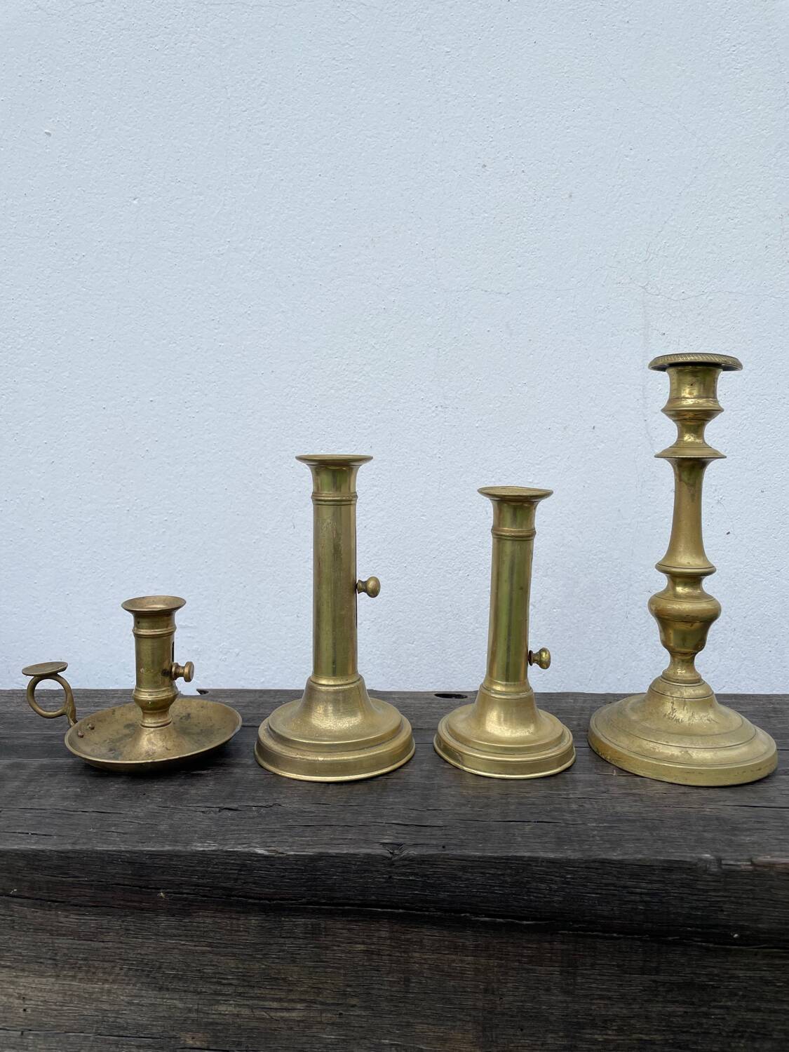 Set of gold-plated brass candlesticks