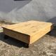 Old wooden school platform bass table on metal wheels