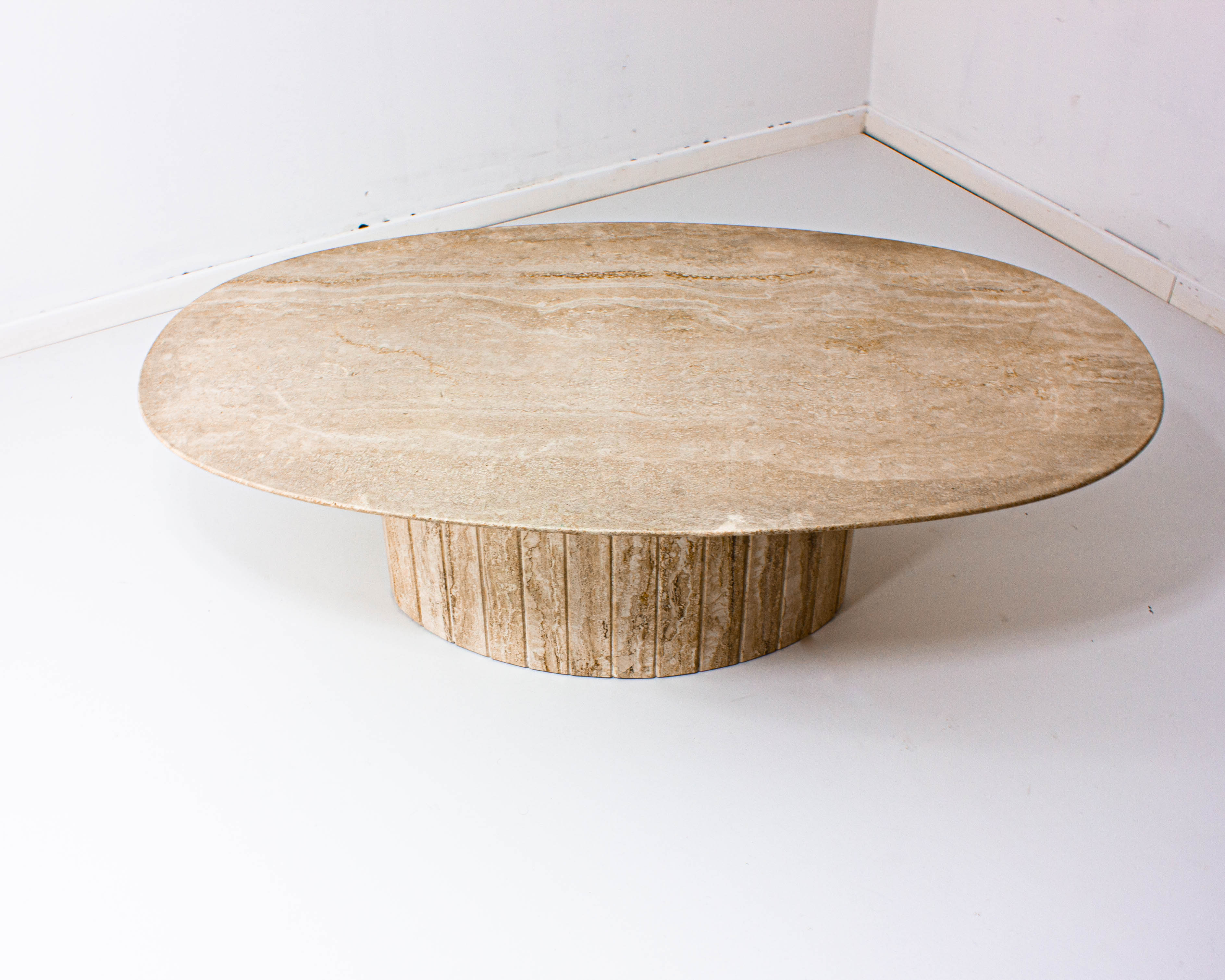 Oval Italian coffee table in travertin, 1970s