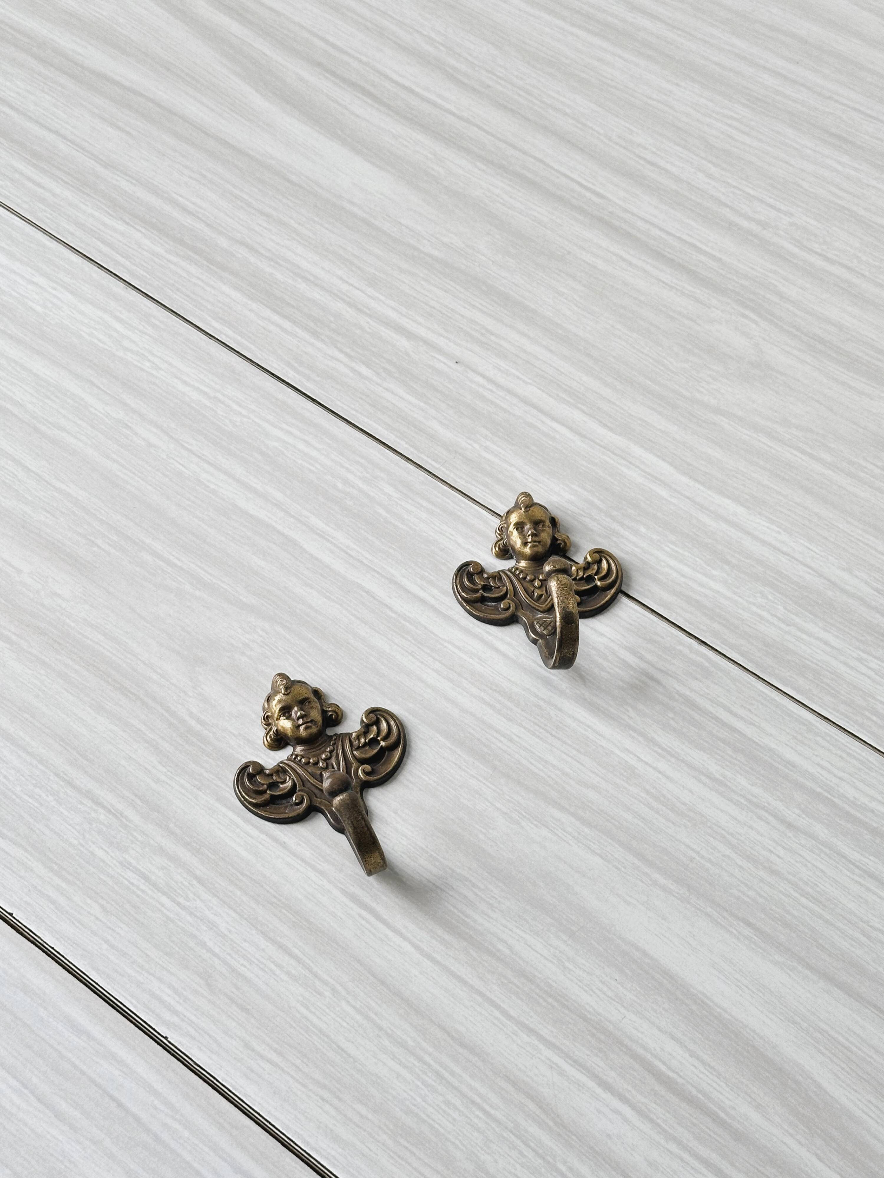 Set of metal coat hooks / angel towel hooks