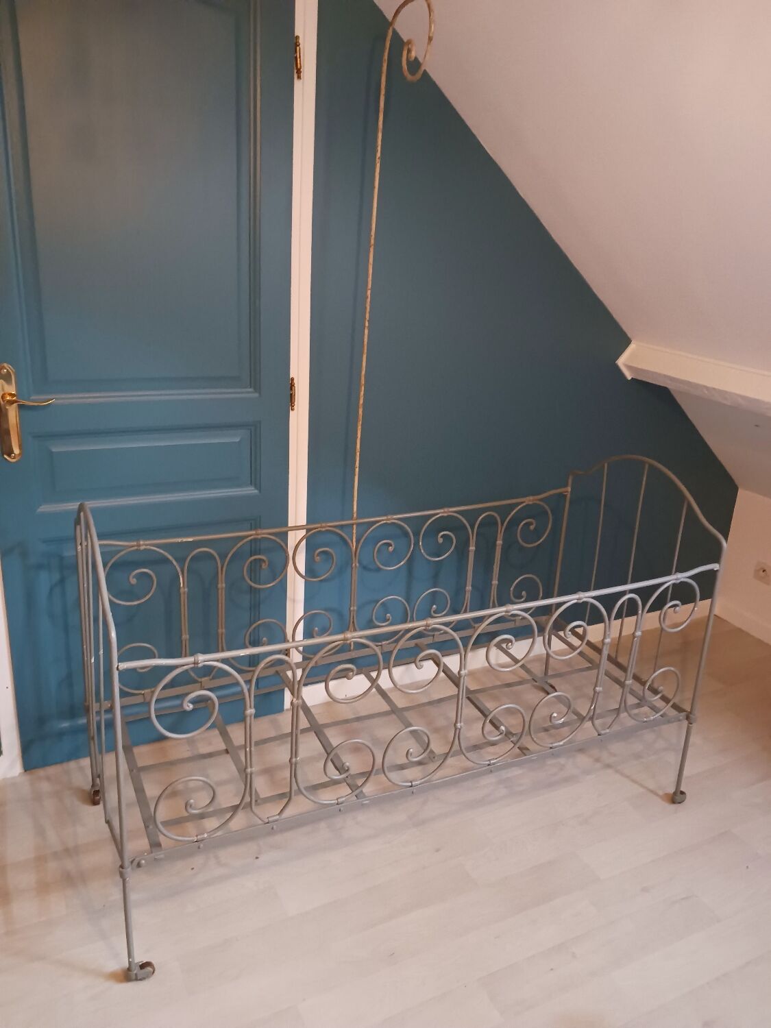 Wrought iron children's bed from the late 19th century.