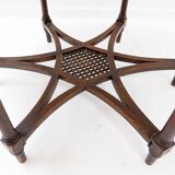 Hexagonal pedestal table or side table with a lattice structure and star pattern.