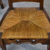 8 rustic oak chairs combining modern lines and Breton craftsmanship by a student of Joseph Savina 1950s