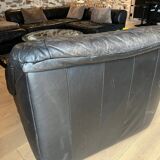 Pair of black leather armchairs from the 80s